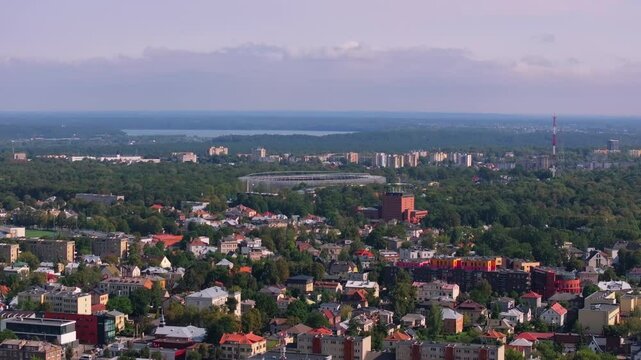 Kaunas, Lithuania, reveals its beauty from an aerial perspective with the Darius and Girenas stadium surrounded by green forest in the background