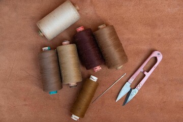 Sewing essentials on red background