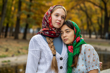 Russian beauty - young beautiful women in a traditional headscarf