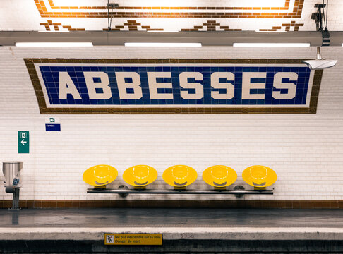 Paris, France: Abbesses subway station with yellow seats