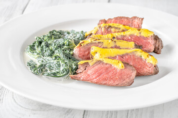 Cheese topped beef steak