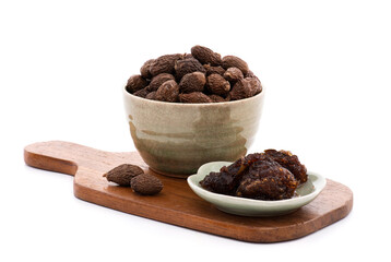 Malva nut or Scaphium macropodum Beaum dried fruits and jelly isolated on white background.