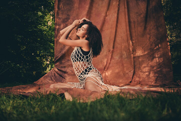 Photo session outdoors of stunning gorgeous lady wearing stylish lace tunic modern art isolated on textile background