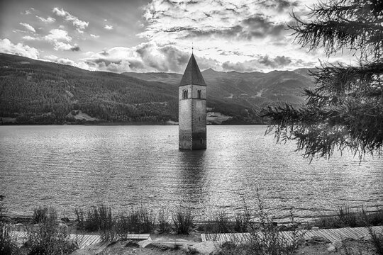 The iconic submerged Church Tower of Graun, Lake Reschensee, Italy