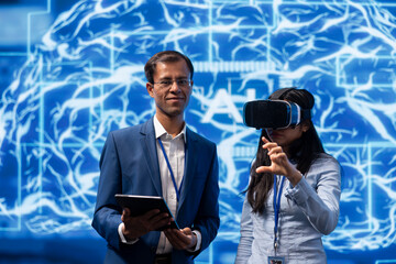 Researchers doing virtual reality demonstration at AI convention gathering tech startups and...
