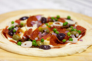 Authentic Portuguese pizza prepared with classic ingredients. Vera pizza