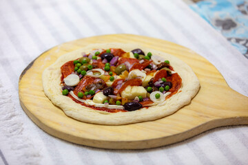 Authentic Portuguese pizza prepared with classic ingredients. Vera pizza