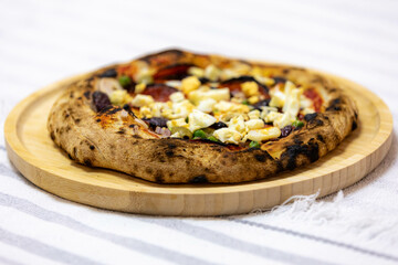 Authentic Portuguese pizza prepared with classic ingredients. Vera pizza