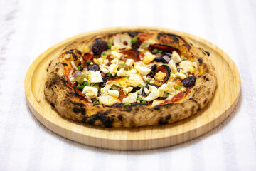 Authentic Portuguese pizza prepared with classic ingredients. Vera pizza