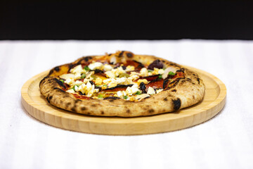 Authentic Portuguese pizza prepared with classic ingredients. Vera pizza