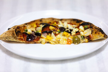 Authentic Portuguese pizza prepared with classic ingredients. Vera pizza