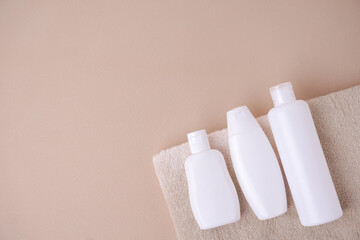 Cosmetic bottle mockup, with cream background, mockup for your product branding