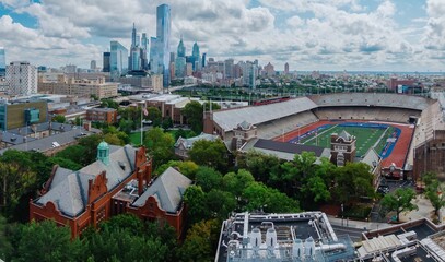 Stadium, buildings and the city skyline at the University of Pennsylvania, Philadelphia,...