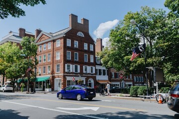 Traffic and historic buildings on Nassau St in downtown, Princeton, New Jersey, United States.