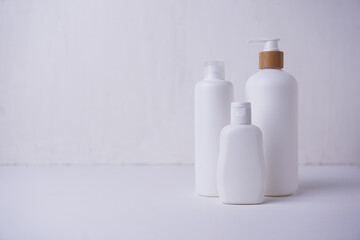 Cosmetic bottle mockup, with cream background, mockup for your product branding