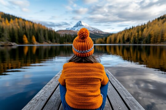 A person looking out over the water from a bridge, lost in thought and gratitude, capturing the quiet reflection of being thankful for lifeâ€™s journey