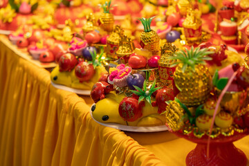 Turtle shaped steam bun with decoration elements selling in the religious prayer ornaments stall...