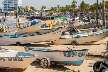 Artisanal fishing boats on the beach in Mazatlan, Mexico