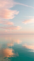 Obraz premium serene, peaceful sea, with still, mirror-like, turquoise water reflecting a warm, soft, pastel-hued sky at sunrise or sunset,