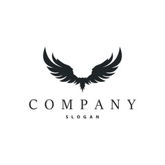 Obraz premium Black silhouette animal wings with simple and minimalist wing logo design concept