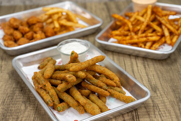 Variety of crispy crunchy side order appetizers to choose from with the breaded string beans up front