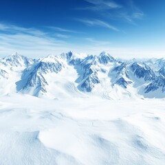 Obraz premium A breathtaking snow-covered mountain landscape under a clear blue sky.
