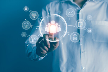 Businessman point at business icons. Team strategy, marketing and  management concept.