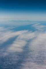 View from an airplane of the Kuril Islands and Sea of Okhotsk on a flight from Vancouver to Tokyo