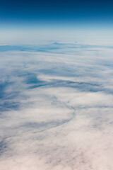View from an airplane of the Kuril Islands and Sea of Okhotsk on a flight from Vancouver to Tokyo