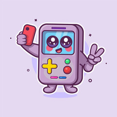 happy portable video game character mascot taking a selfie with a smartphone isolated cartoon