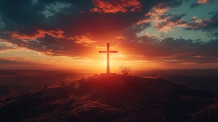Fototapeta premium A silhouette of a cross against a vibrant sunset sky, symbolizing hope and spirituality.