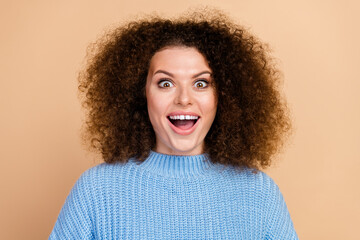 Photo portrait of lovely young lady amazed reaction dressed stylish blue knitwear garment isolated...