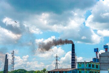 Obraz premium Brick factories air pollution, Factory pipe polluting air, Environmental problems, Chimney of brick factories, Polluted blue sky Concept: Air pollution, Stop pollution, Thermal pollution