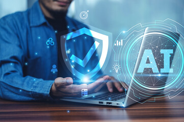 A businessman uses AI for data security to detect potential threats and prevent cyberattacks,...