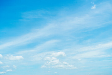 Beautiful clouds during spring time in a Sunny day. Blue sky and white fluffy clouds