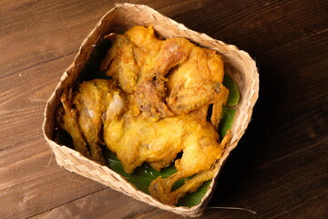 fried chicken in bamboo basket. Indonesian food.
