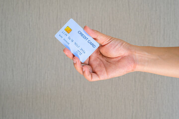 Woman holdin credit cards and he is choosing a credit card to pay and spend Payment for goods via credit card. Finance and banking concept	
