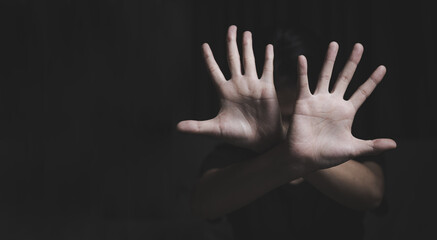 woman raised her hand for dissuade, campaign stop violence against women. sexual abuse, human trafficking,domestic violence rape international women's day,