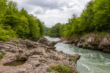 nature park , spring mood, a walk along the riverbed with an overview of the stone riverbed