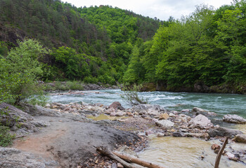 nature park , spring mood, a walk along the riverbed with an overview of the stone riverbed