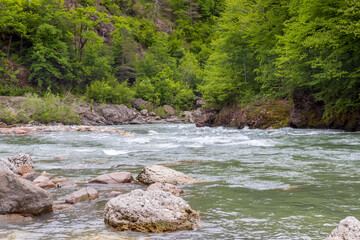 nature park , spring mood, a walk along the riverbed with an overview of the stone riverbed