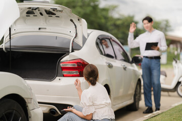 Car Accident Report: Woman Reporting Damage to Insurance Adjuster 