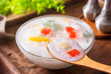 Bubur Cha Cha dessert made from tapioca pearls, sweet potato, taro, tapioca jelly, sugar palm fruit and coconut milk. 