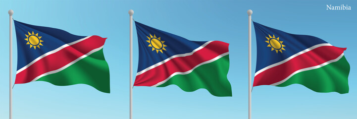 Set of three flags of Namibia waving on flagpoles