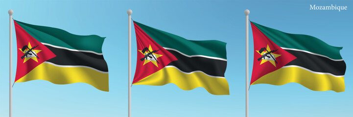 Set of three flags of Mozambique waving on flagpoles