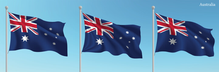 Set of three flags of Australia waving on flagpoles