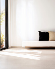 Modern minimalist living room with a white couch and decorative pillows in bright sunlight