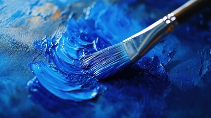 Close-Up of a Paintbrush and Blue Paint