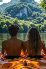 A young couple relaxes in their kayak, taking in the peaceful surroundings of the lake and verdant hills under a clear summer sky