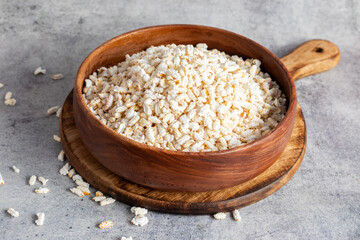 Khoi is a puffed rice snack, light and crispy, commonly enjoyed in Bengal, used in traditional...